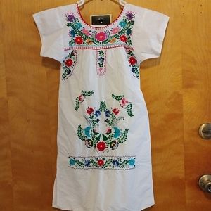 Handmade typical embroidery girl dress.